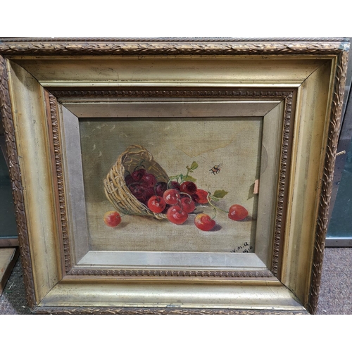 450B - Oil on canvas, still life of fruit in bowl, monogrammed W.M.G dated 1910, in gilt frame