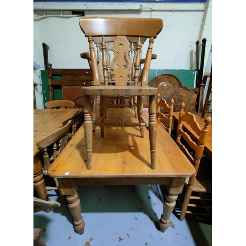 578 - A Victorian style pine kitchen table with rectangular top, on turned legs; 4 (2 + 2) beech fiddle ba... 