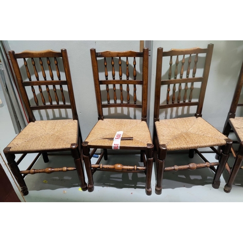 686 - A 19th century set of 6 country made elm dining chairs with spindle backs and rush seats (some seat ... 