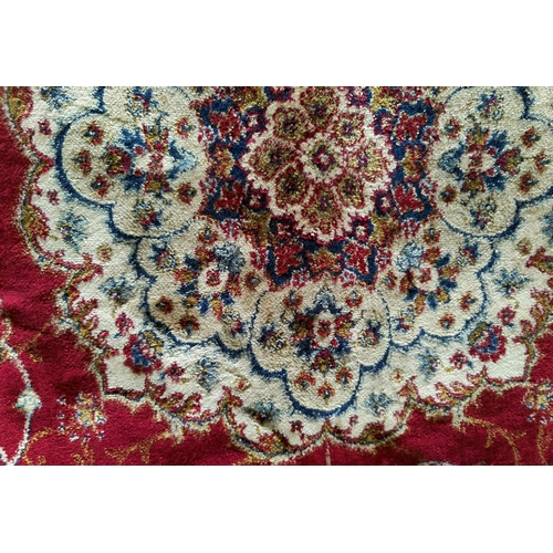 482 - A Kashmir rug with floral medallion pattern on red ground, 240 x 160 cm