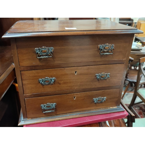 55 - An Edwardian mahogany miniature 3 height chest of drawers, width 47 cm