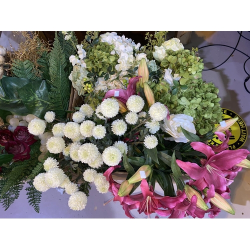 11 - A large quantity of artificial flowers