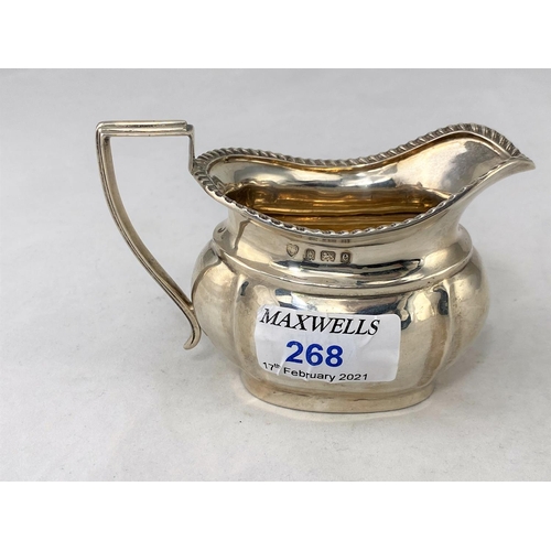 268 - A Georgian style silver cream jug, 3.4oz, Birmingham, 1904