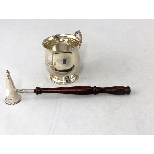271 - A silver baluster shaped christening mug, 4.1oz and a silver candle snuffer with turned hardwood han... 