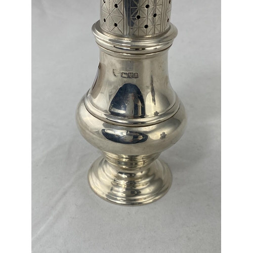 276 - A heavy silver Georgian style baluster shaped sugar caster, 5.9oz Chester, 1905