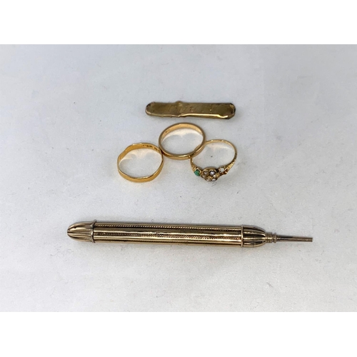 298 - A 22 carat wedding ring size 'N', 1.5 gm (a.f.); a brooch stamped '9ct'. 1.4 gm (a.f.); a wedding ri... 