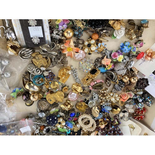 332 - A large selection of costume jewellery earrings