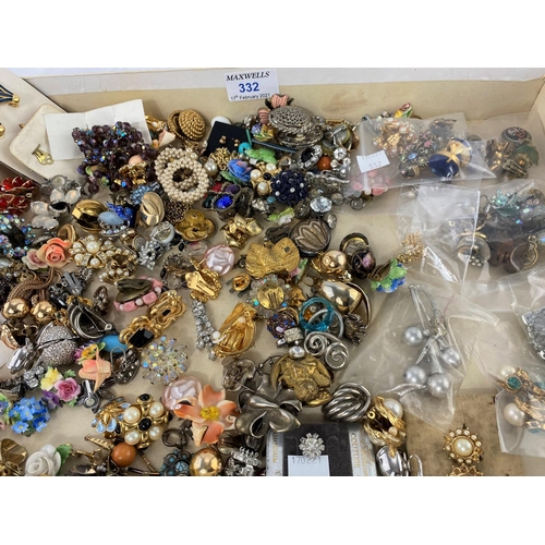 332 - A large selection of costume jewellery earrings