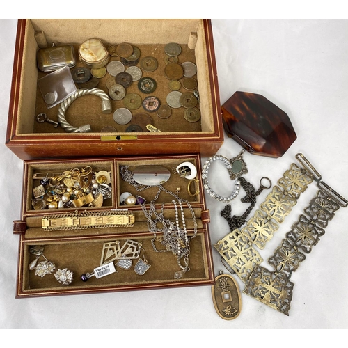 340 - A brown leather jewellery box with a selection of costume jewellery; Chinese coins; etc.