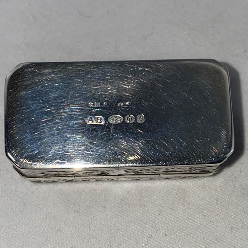 357 - A rectangular pill box with embossed decoration, import marks 1878