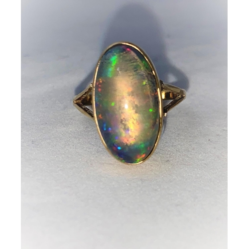 377 - A 9 carat hallmarked gold dress ring set large oval opal coloured stone size 'O'; a 9 carat hallmark... 