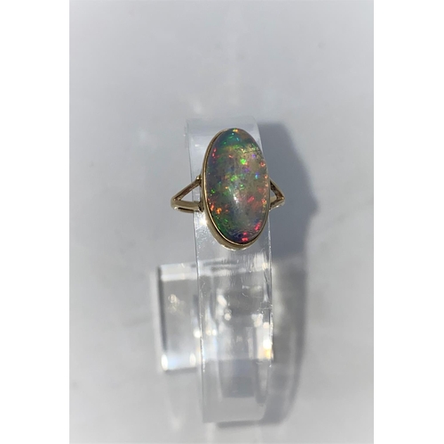 377 - A 9 carat hallmarked gold dress ring set large oval opal coloured stone size 'O'; a 9 carat hallmark... 