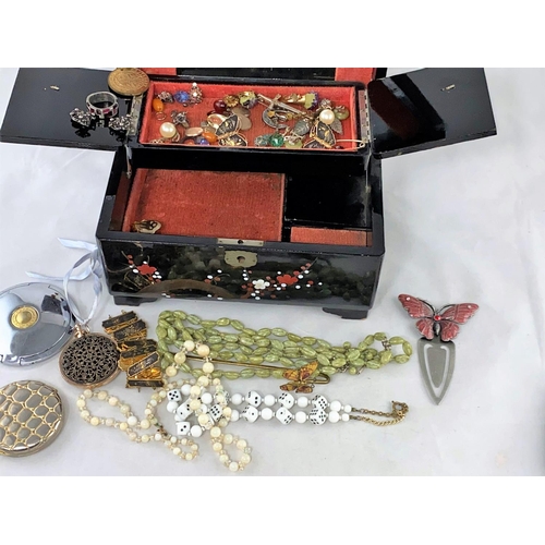 378 - A lacquer jewellery box and a selection of costume jewellery