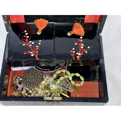 378 - A lacquer jewellery box and a selection of costume jewellery