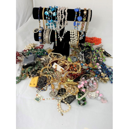 379 - An unusual selection of costume jewellery including brooches, necklaces etc