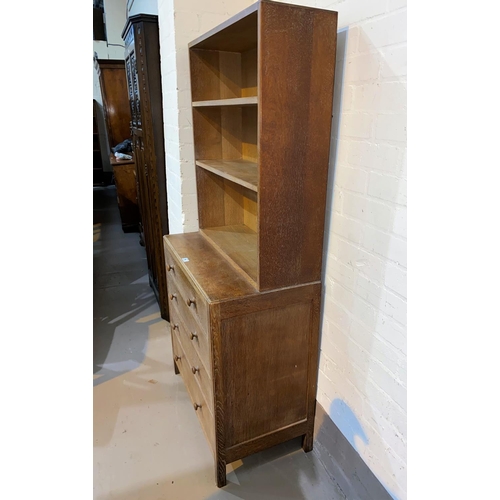 500 - A 1930's limed oak 4 height chest of drawers with bookcase top, by Heals, height 158cm x length 76cm... 