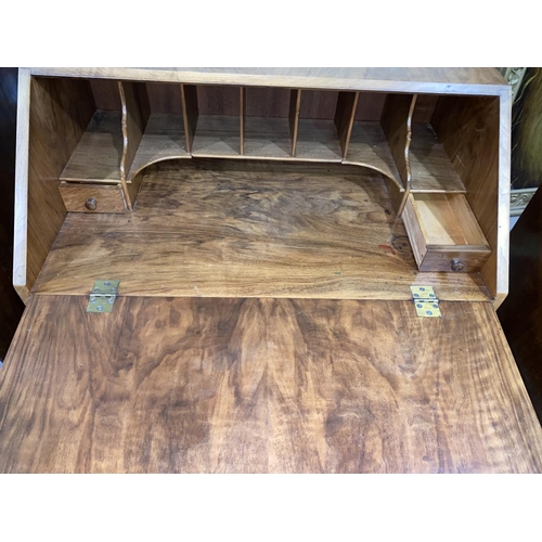 504c - A Heal & Son 1930's walnut bureau with fall font, 2 long and 2 short drawers, width 76 cm