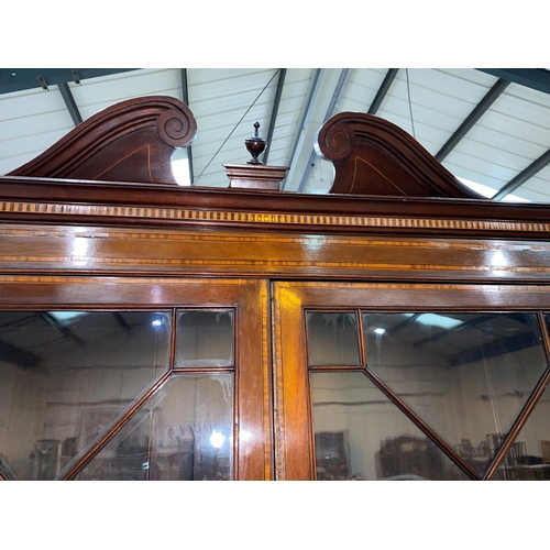 607 - A George III mahogany bureau with fall front enclosing central boxwood inlaid cupboard door flanked ... 