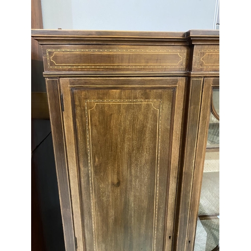 619 - An Edwardian inlaid mahogany display cabinet in the Sheraton style with central glazed and 2 panelle... 