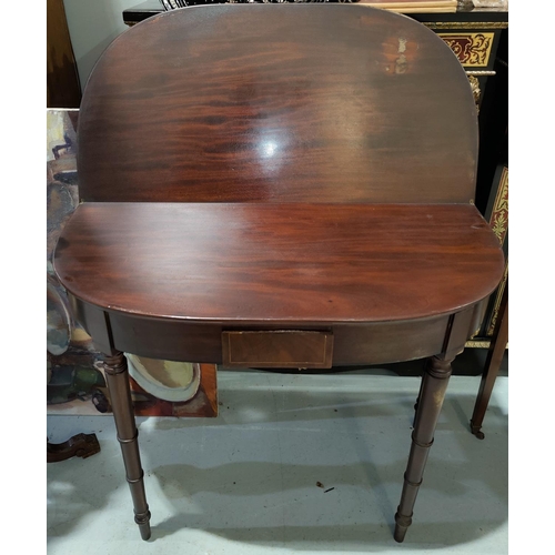 668 - A late Georgian tea table with fold-over 'D' end top, on turned tapering ringed legs, width 93 cm