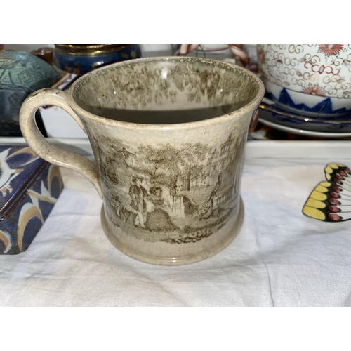 207 - An early 19th century transfer printed mug of wasted form; a Rye pottery hen vase; miniature and dec... 