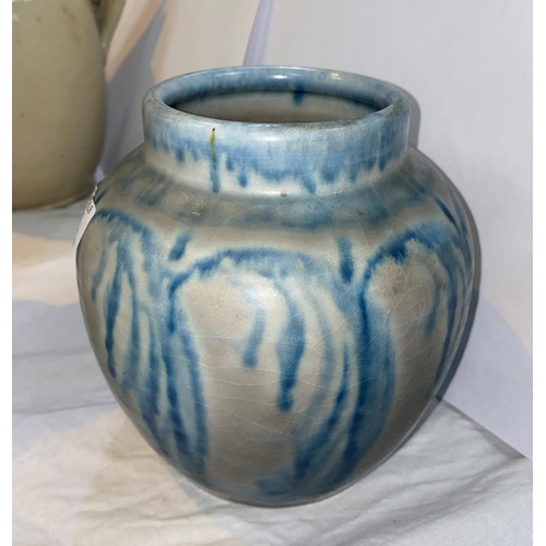 211 - A Royal Lancastrian vase of ribbed ginger jar form, with blue fronds over grey, impressed mark 'E.T.... 