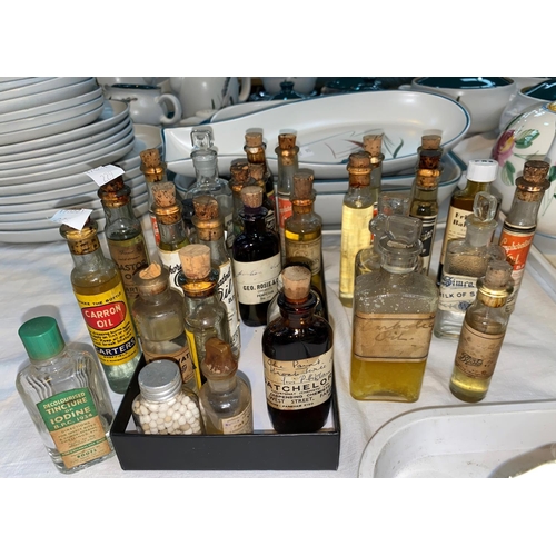 229 - A selection of chemists bottles with original labels:  