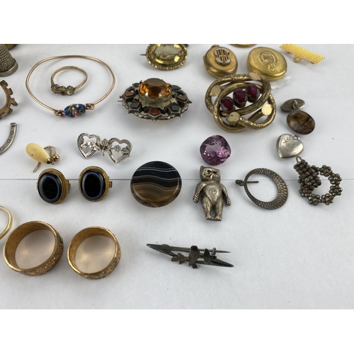 369 - A selection of Victorian and later costume jewellery:  bangles; lockets; brooches; etc.