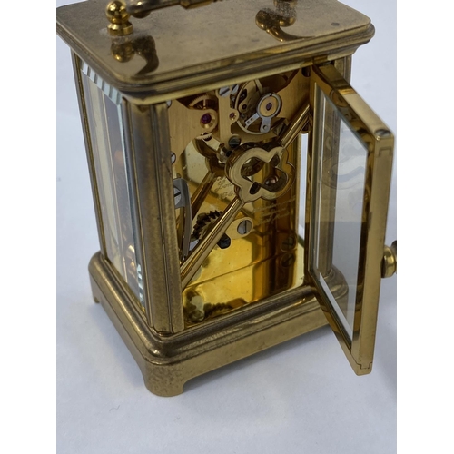 459 - A modern dwarf carriage clock by Matthew Norman, London, height 7 cm