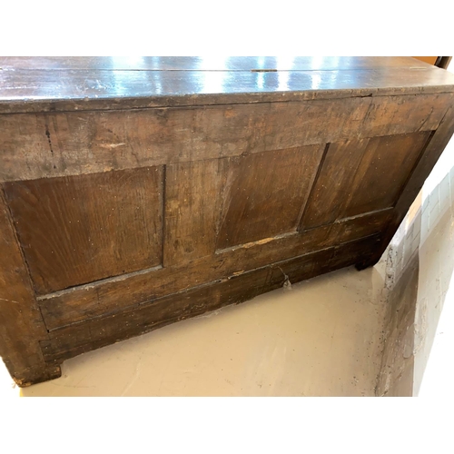 496 - An 18th century framed and panelled oak mule chest, with raised fielded front panels and 2 base draw... 