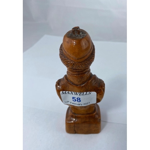 58 - A carved wooden bust of a man in robes of office, height 12.5cm