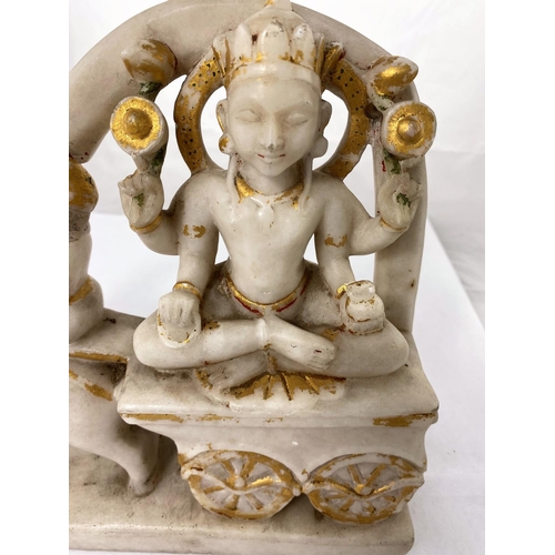 142 - A 19th century Indian carved alabaster group , a deity pulled on chariot with gilt highlighting, len... 