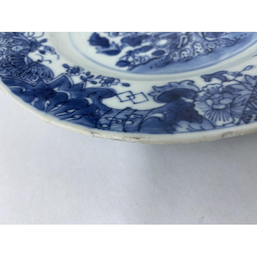 162 - A Chinese blue and white octagonal dish decorated with trees and plants, 23cm; a similar Chinese blu... 