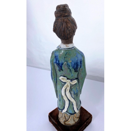 165 - A Chinese ceramic figure of woman in robed and flowers, mounted on velvet stand, height 35cm and Chi... 