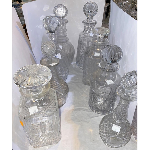 197 - A selection of 8 cut glass decanters