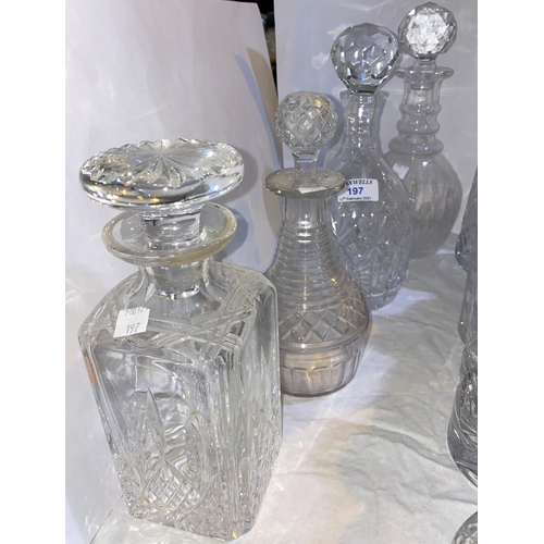 197 - A selection of 8 cut glass decanters