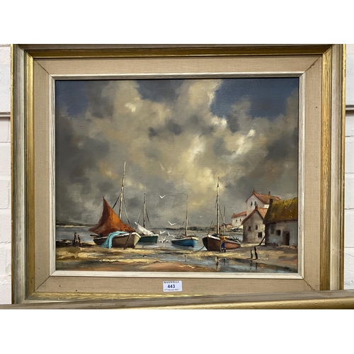 443 - Gudrun Sibbons:  Shoreline scene with beached sailing boats and white cottages, oil on canvas, signe... 