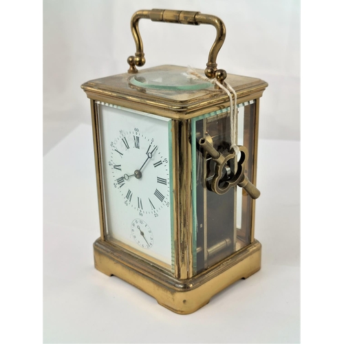 463 - A late 19th/early 20th century brass carriage clock with white enamel dial and timepiece movement wi... 