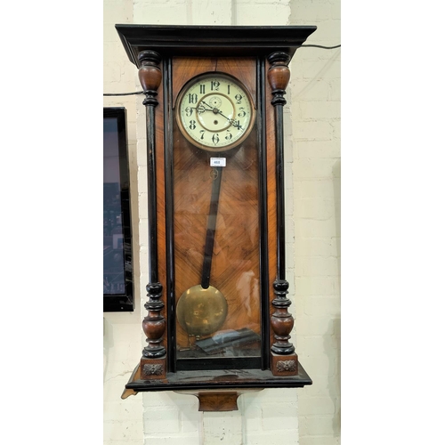 468 - A 19th century Vienna wall clock in walnut case with ebonised mouldings, white enamel circular dial ... 