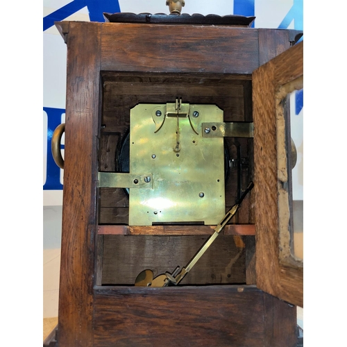 471 - A late Georgian bracket clock in rosewood case with brass finial, ring handles and ball feet, circul... 