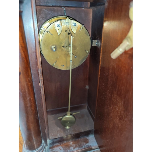 472 - A 19th century French 4 pillar clock in mahogany case with white enamel circular dial and ormolu bez... 