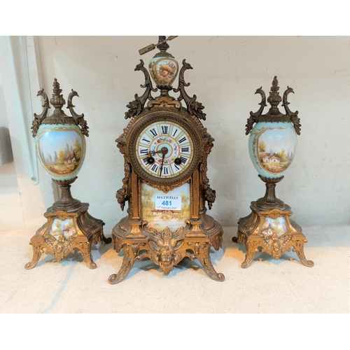 479A - A 19th century French 3 piece clock garniture in ornate gilt metal and porcelain decorated with rura... 