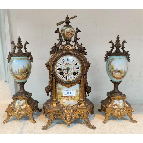 479A - A 19th century French 3 piece clock garniture in ornate gilt metal and porcelain decorated with rura... 