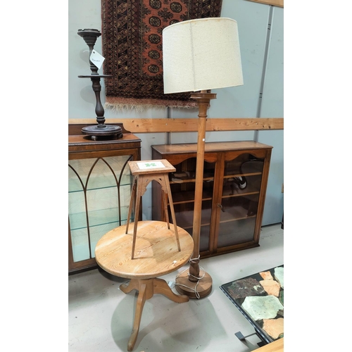 481 - A stained wood standard lamp; a tile top plant stand; a pine occasional table with circular top and ... 