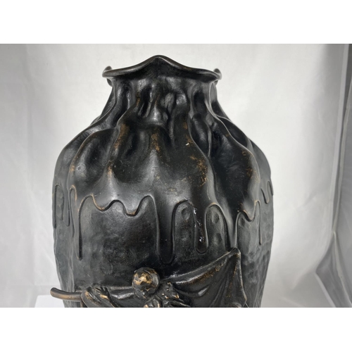 135 - A large Japanese Meiji period bronze vase modeled to look like ceramic with heavy glaze dripping fro... 