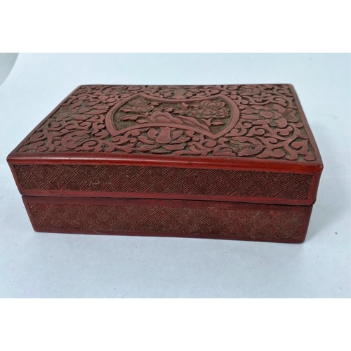 135C - A Chinese cinnabar coloured lacquer box of squared form cigarette box 14.5cm