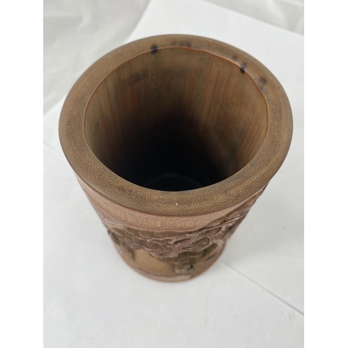 143A - A Chinese carved bamboo brush pot 16cm height