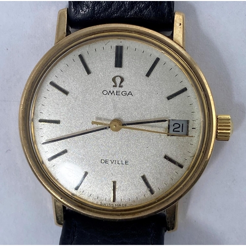 322 - A yellow metal cased 1960's / 70's Omega DeVille wristwatch with champagne dial, baton numerals and ... 