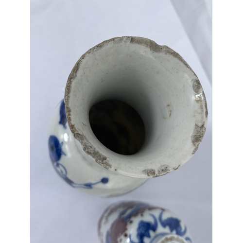163A - A Chinese blue and white vase decorated with various characters, mark to base with chipping to rim, ... 