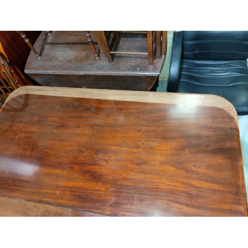 546 - A Victorian rounded rectangular mahogany extending dining table with 1 spare leaf, on turned and car... 